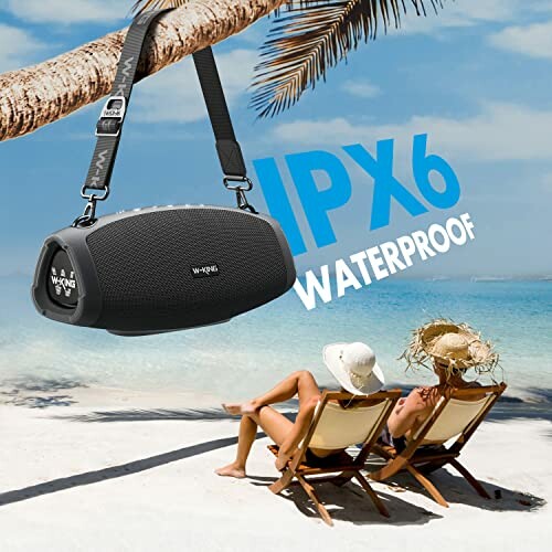 Portable speaker with IPX6 waterproof rating on a beach scene.