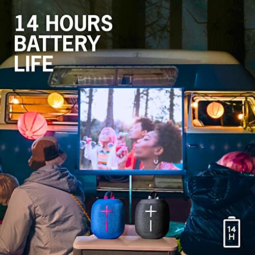 Outdoor movie setup with portable speakers and 14-hour battery life.